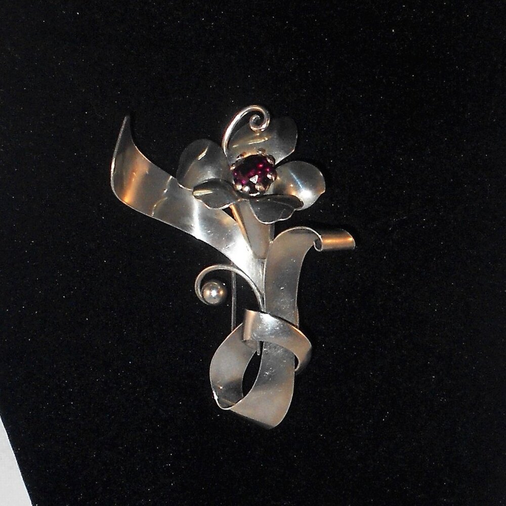 1940's CARL-ART Sterling Silver Brooch/Pin Floral Design With Purple Rhinestone